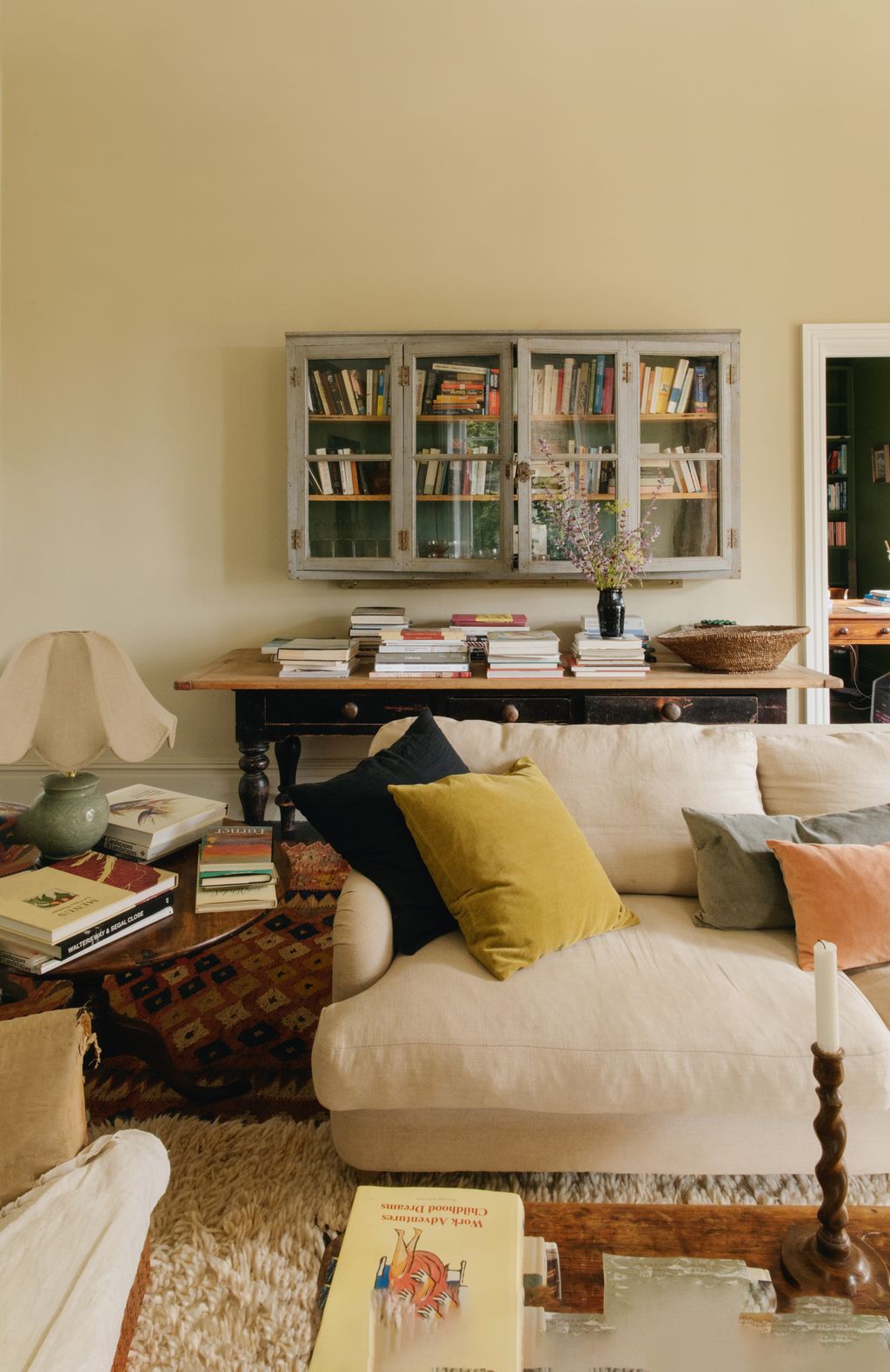 Clares sitting room is furnished with an appealing mix of pieces including a Loaf sofa with Kirsten Hecktermann velvet...