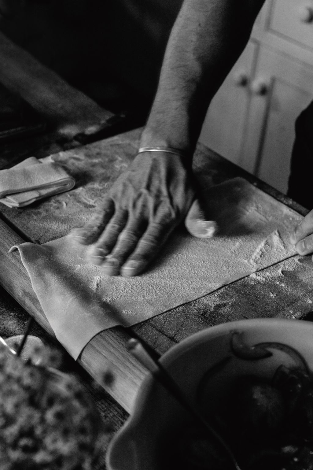 Tom rolls out fresh pasta dough