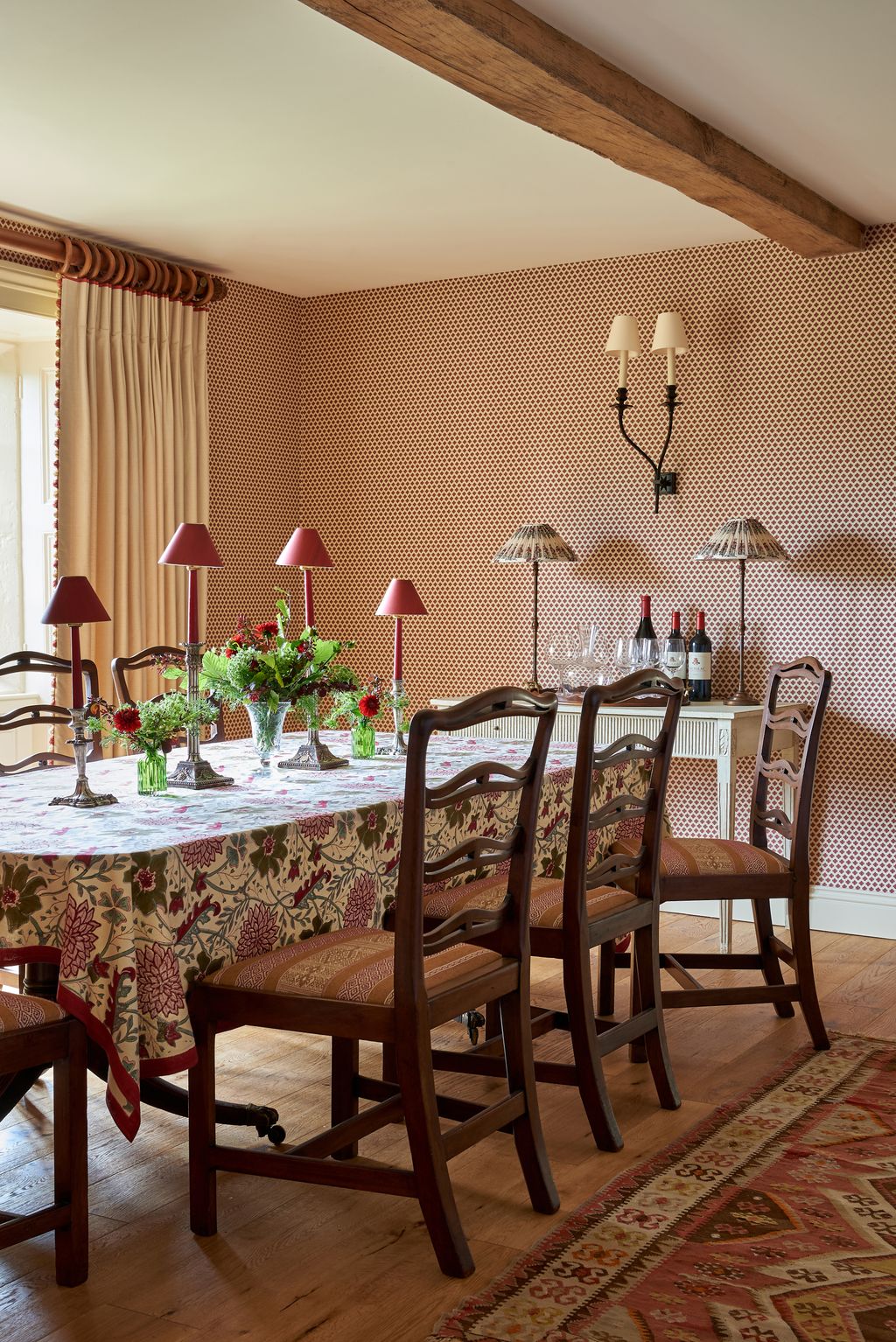 The dining room is elegant yet still welcoming. The table was an antique find from Prior Willis as were the dining...