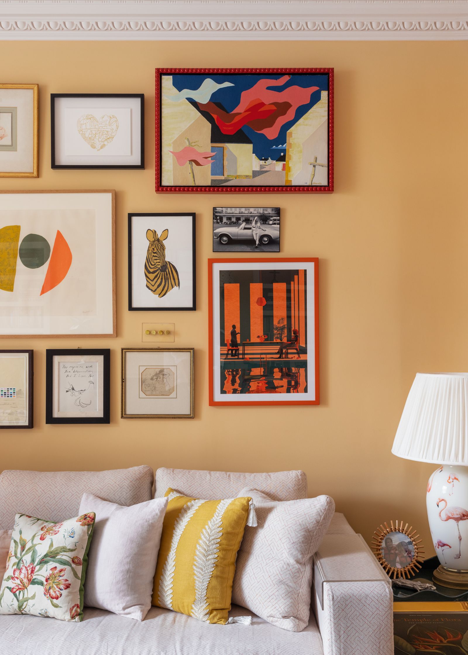 Cushions in the sitting room correspond with the wall colour.