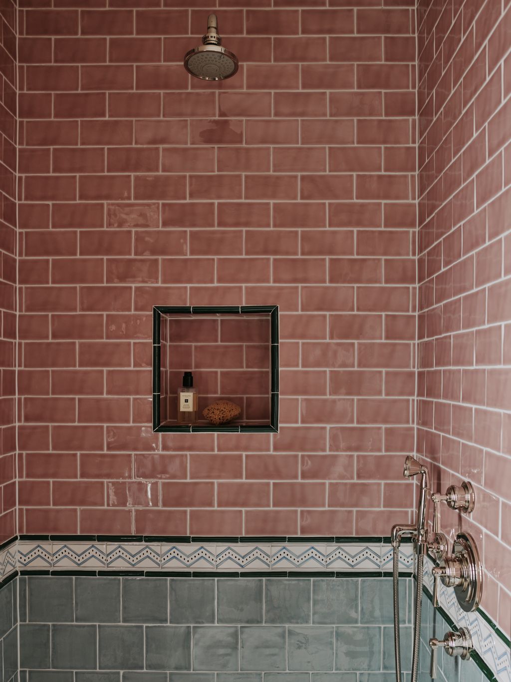 The tiles in the shower were custom made by Malborough Tiles to match the Antoinette Poisson wallcovering.