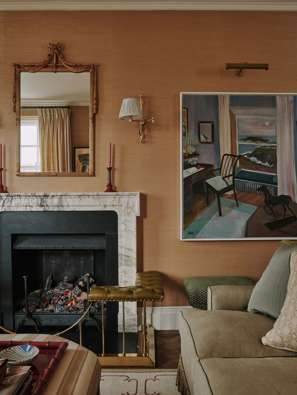 The antique mirror sourced from 1st Dibs and Lottie Cole's large painting Writer's Block give integrity to the interior.