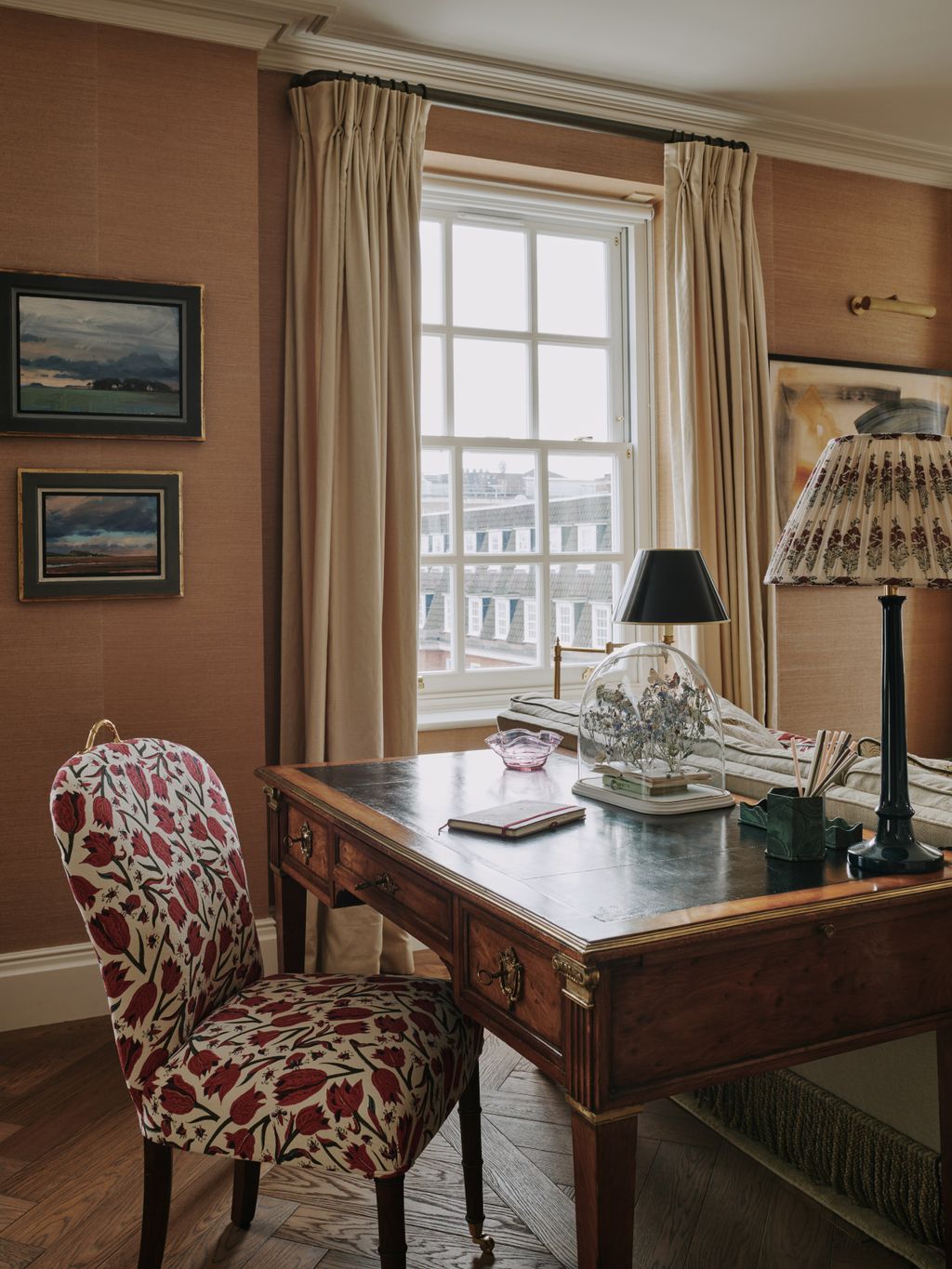 The mid C19th Napoleon III desk cleverly works to separate the space in this large room whilst also providing a handy...