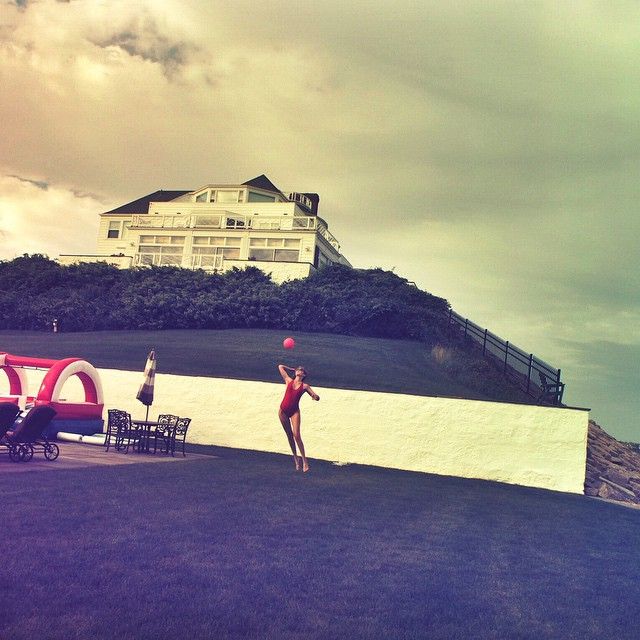 Taylor playing volleyball at her house in Watch Hill Rhode Island captured by her friend model Gigi Hadid.