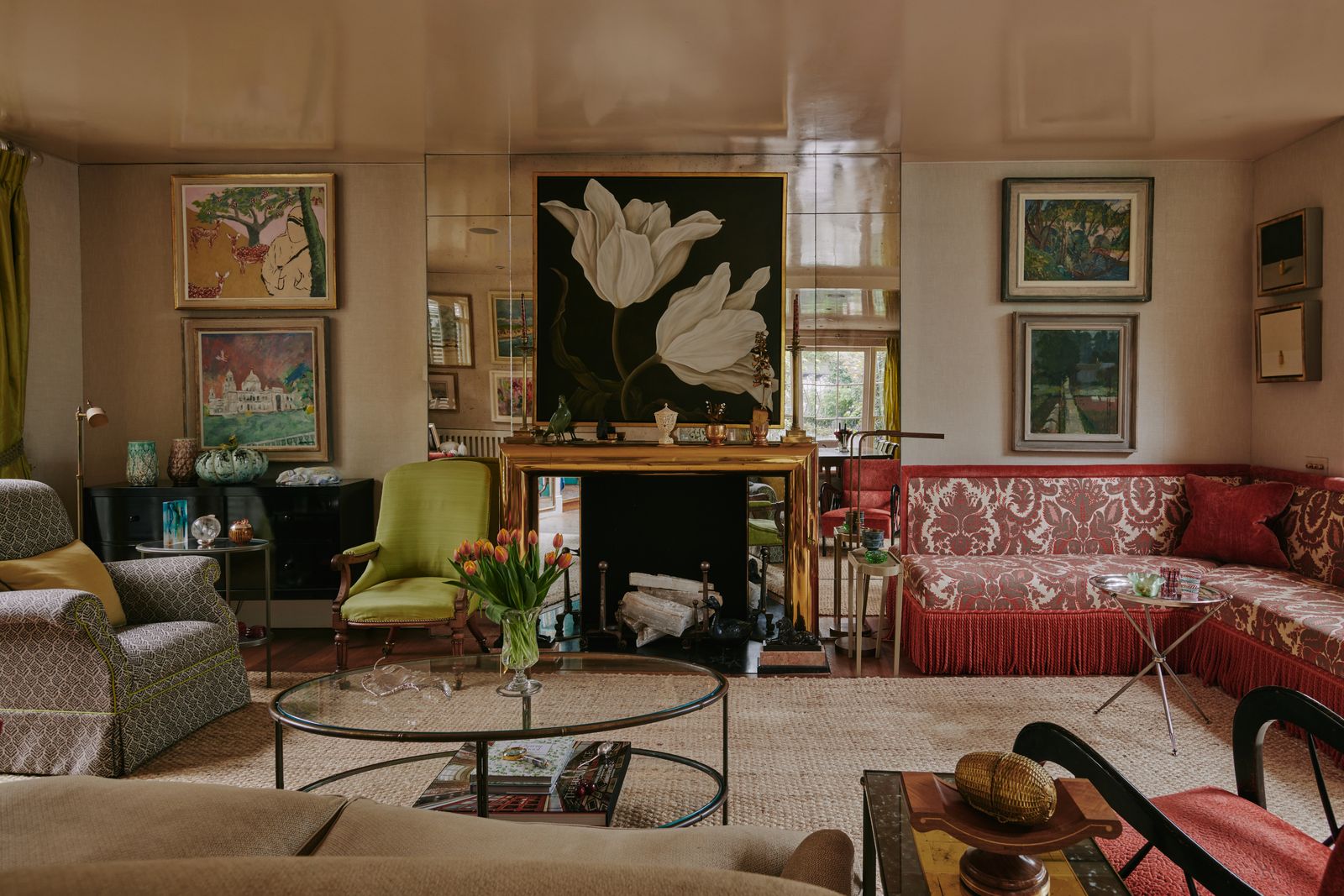 ‘Oh its a bit Alice in Wonderland' says Nina Campbell of the nonfunctional fireplace in her London house. 'Because of...