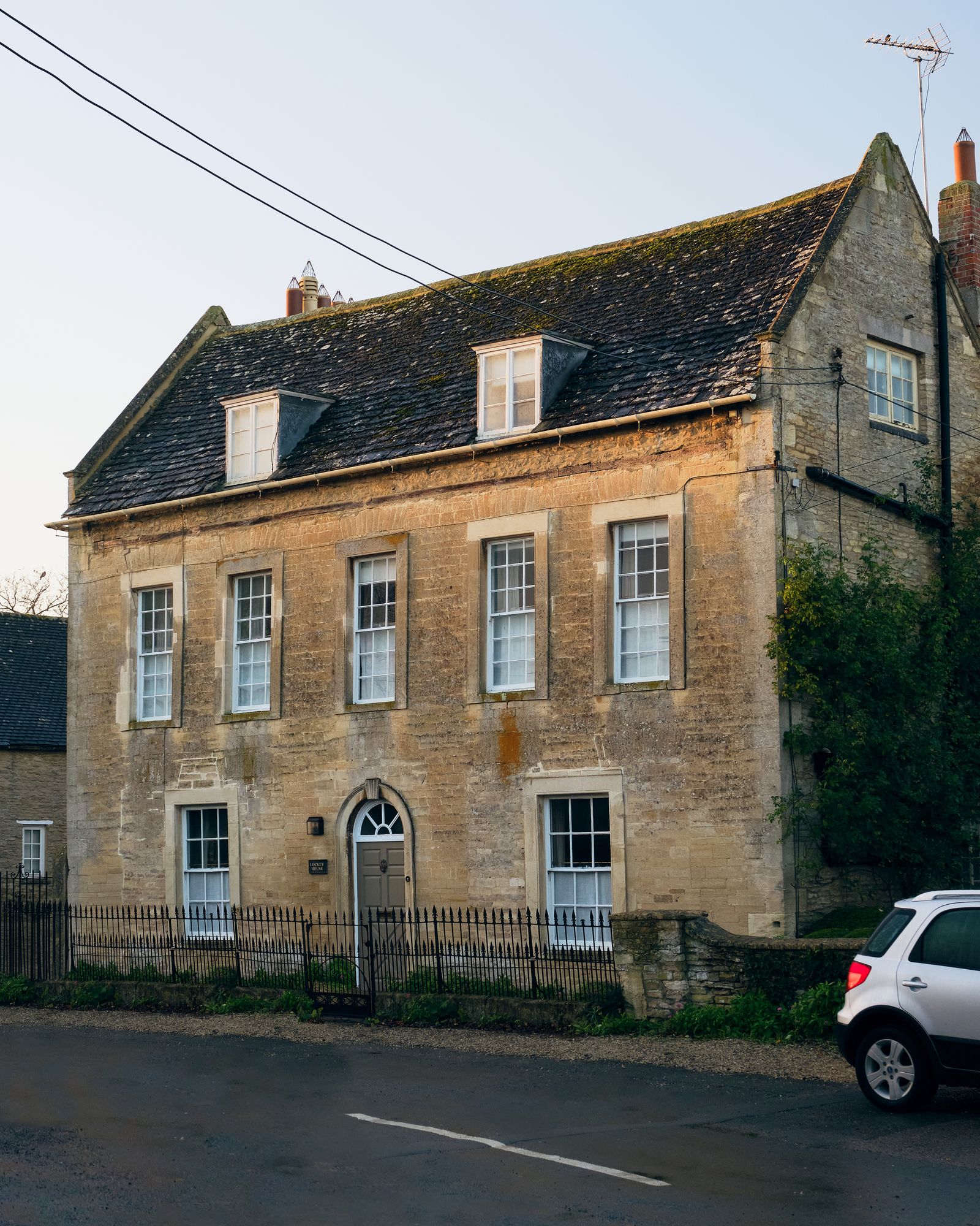 An 18thcentury honeycoloured Cotswold house neatly balanced between history and modernity