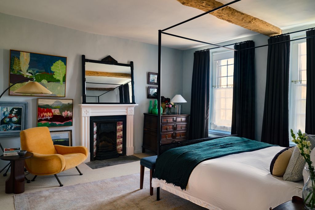 The walls are painted in Skylight by Farrow and Ball. The handsome chest on the right was inherited by the clients. The...