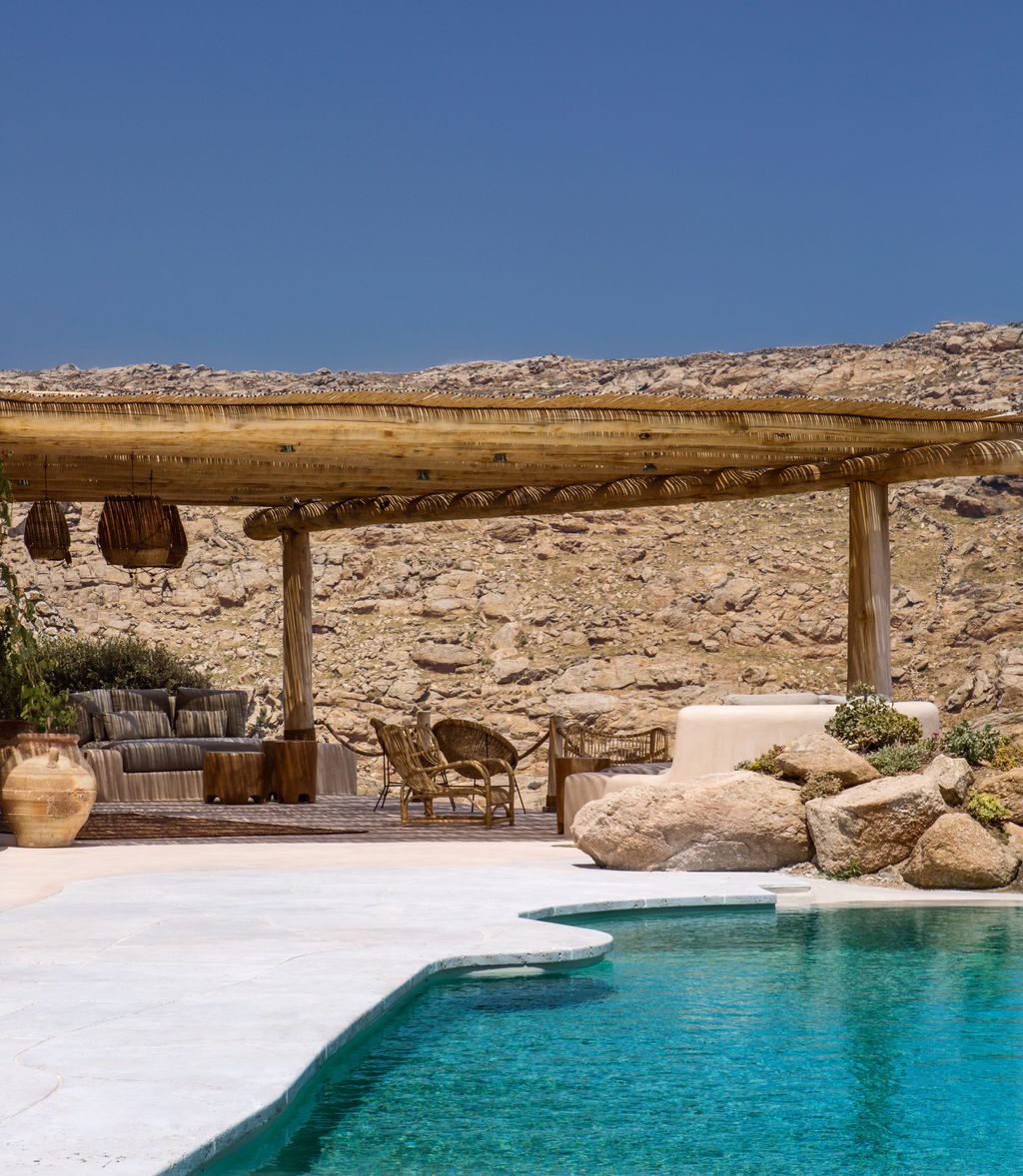 The sinuous edges of the pool soften its appearance.