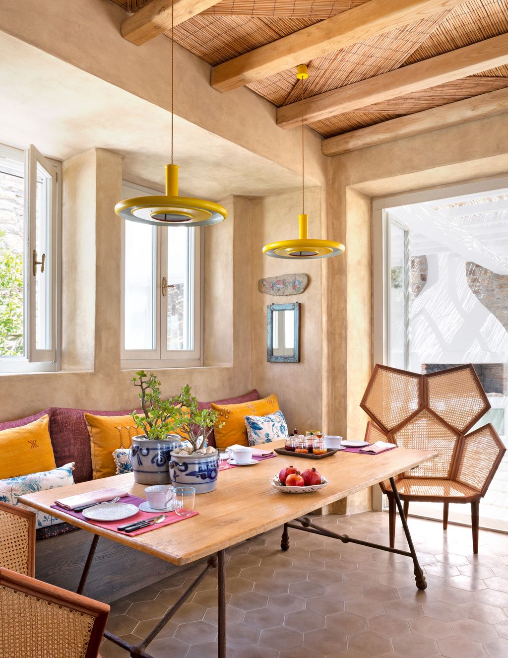 Fratelli Boffis ‘Lui5 chairs are teamed with an oak table bought in London from Petersham Nurseries and yellow ‘Optima 6...