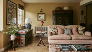 The marriage chest is from John Cornall Antiques as is the Austrian cupboard behind the sofa. On the left a panel of...