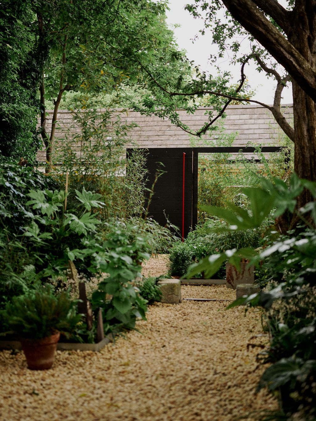 A peak into the ‘secret garden. Built by Atticus Branch and Jon Haye the red handle is actually a spray painted clothes...