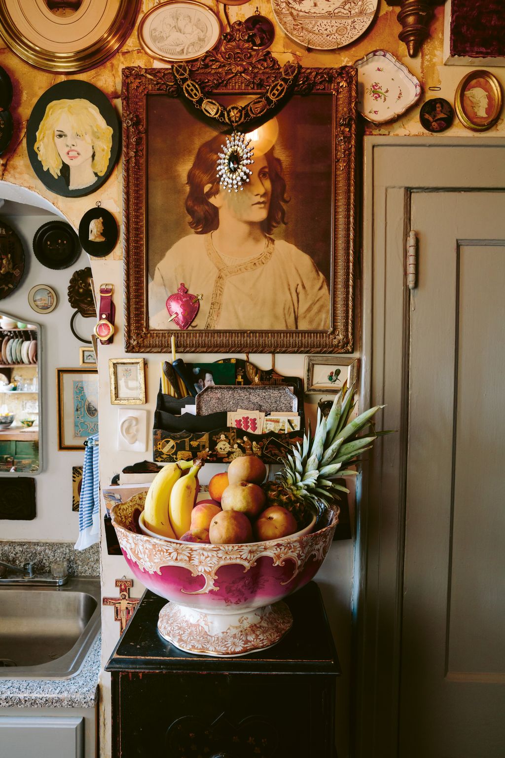 Religious artwork is among the fascinating medley of pieces showcased in the tenement kitchen