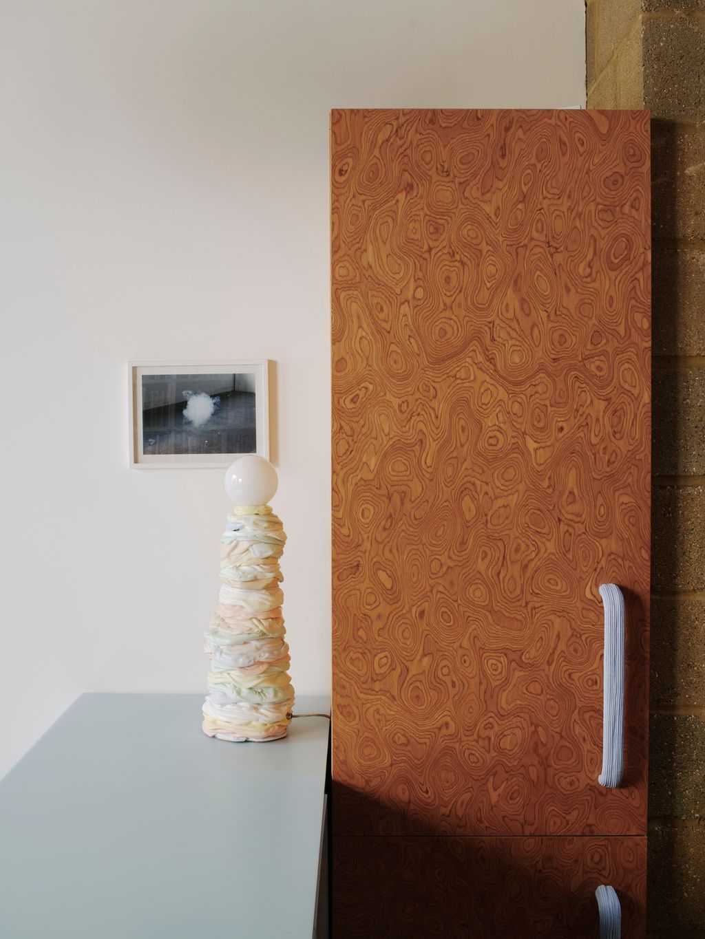 Shaw's recycled plastic creations are on display throughout the house. Here a ‘Blob lamp sits on the kitchen island. The...