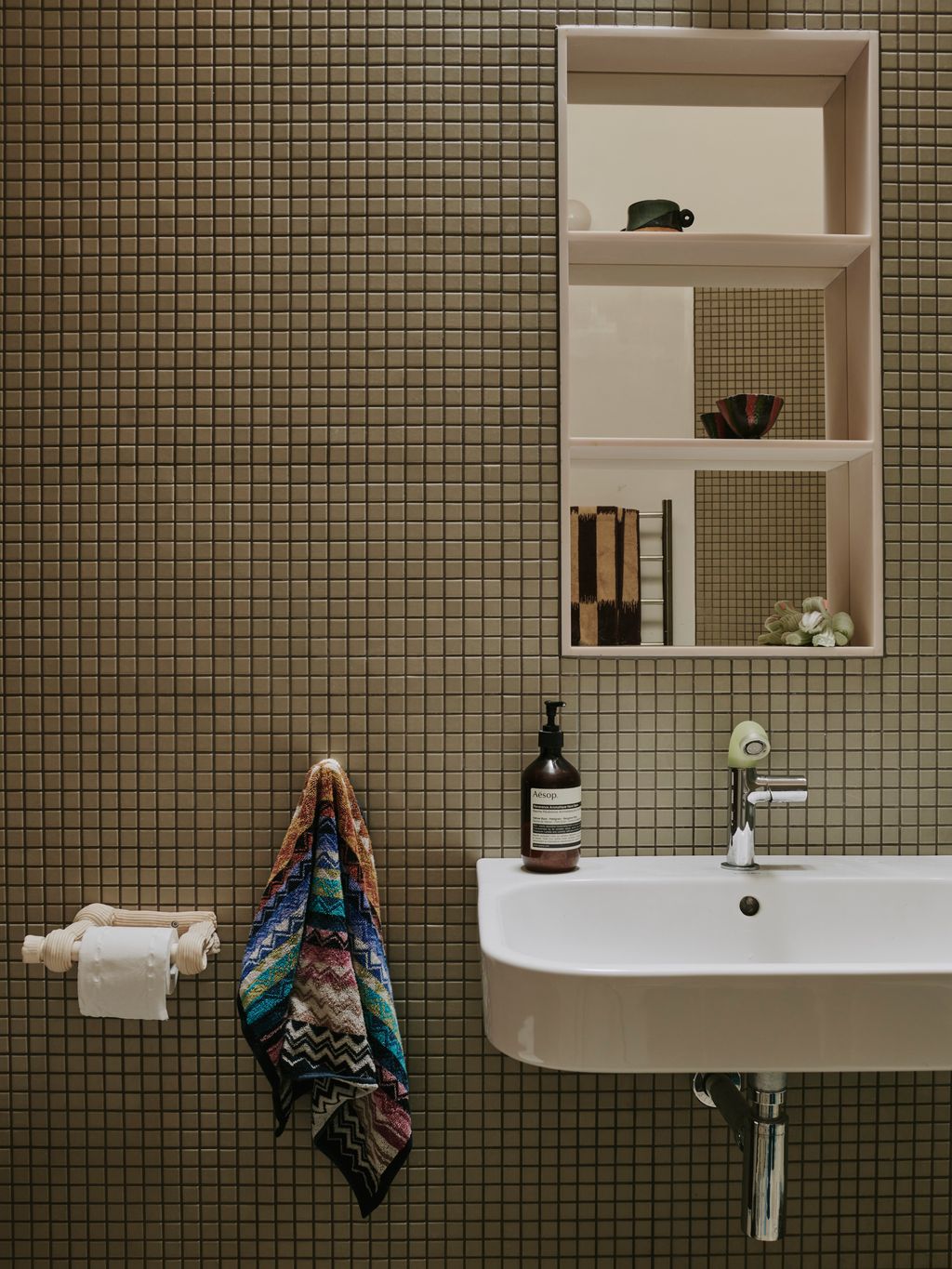 The toilet roll holder is by James Shaw.