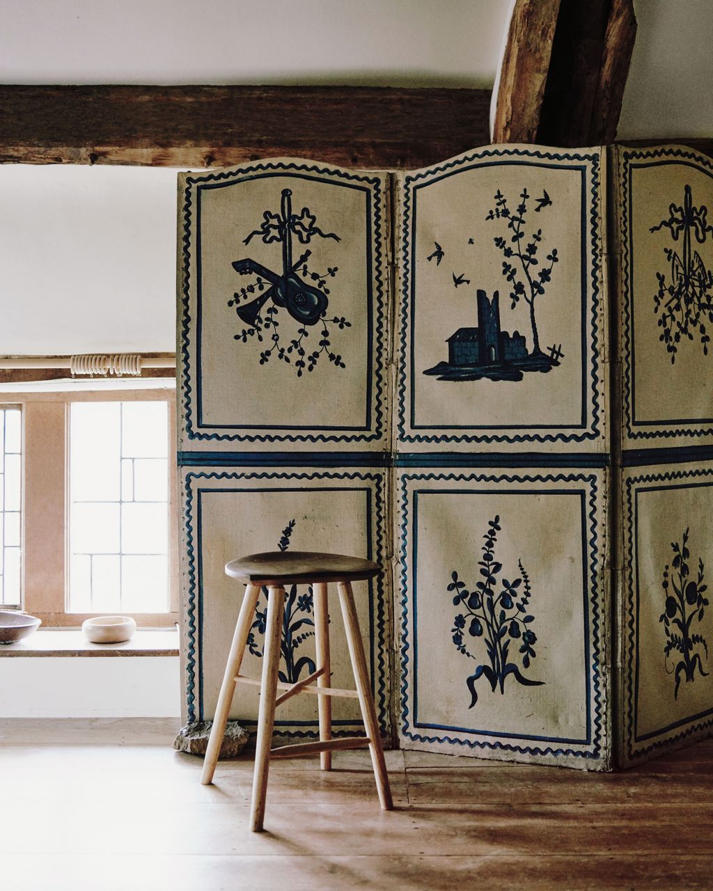 This handpainted screen is in the Devon farmhouse of ceramicists Cath and Jeremy Brown of Feldspar. As screens were...