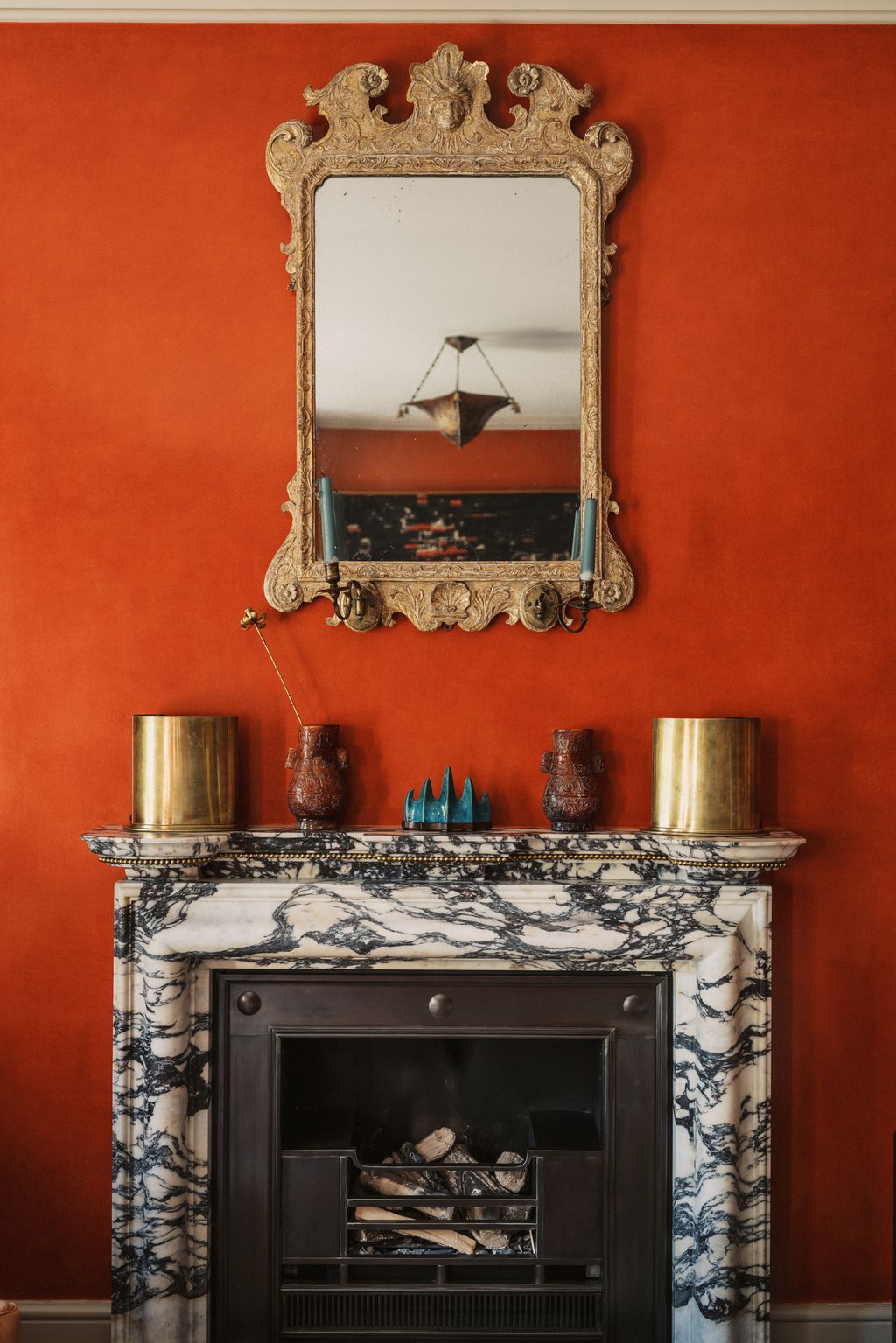 The George II giltwood wall mirror c.1740 was purchased from Hawker Antiques.