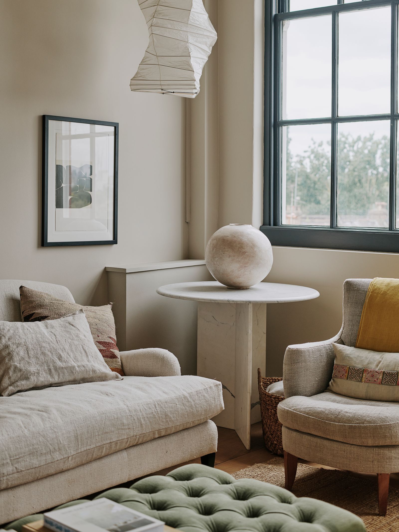 In Cassandra Ellis' former house in London the living room sofas and chairs which Cassandra designed were upholstered...
