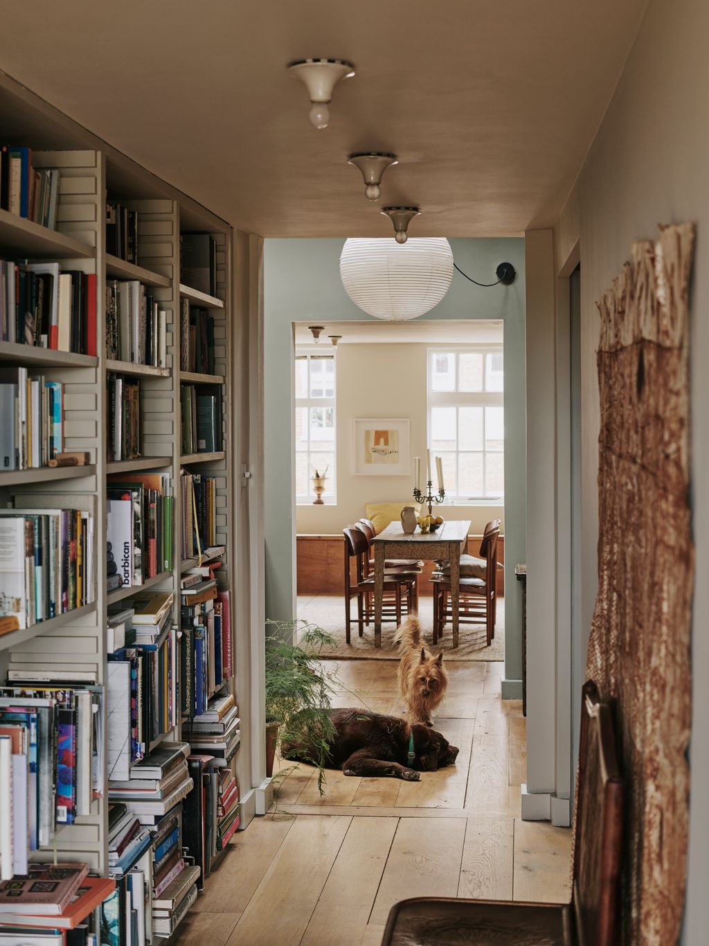 If you happen to have a reasonably wide hallway or landing adding bookshelves can be a brilliant way to add interest ....