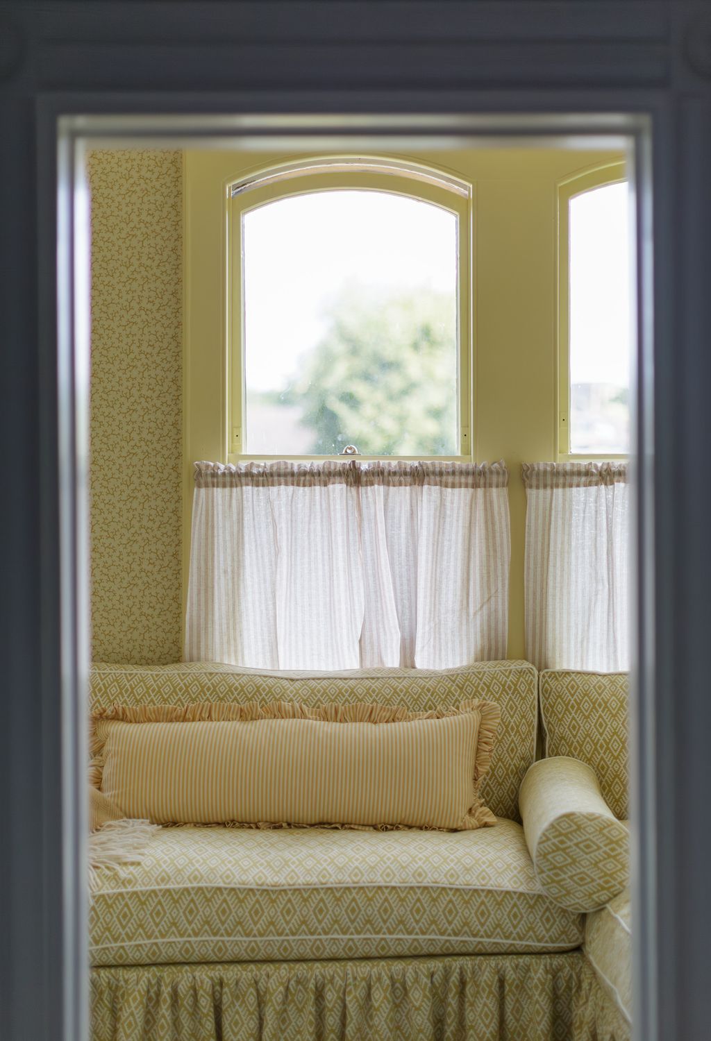 What was once a bathroom is now a bright reading room which is flooded with light.