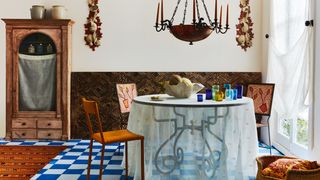 A shoppable summer scheme of airy textiles and striking antiques