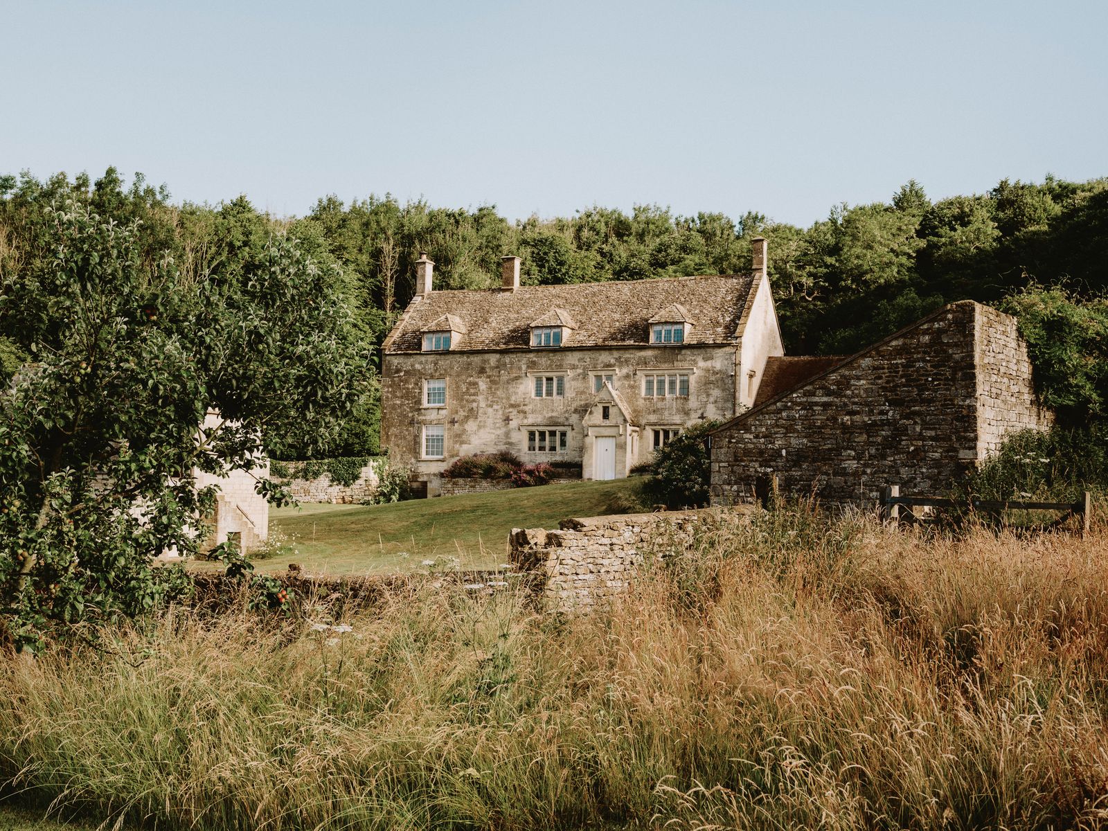 The limestone farmhouse with its early 18thcentury core and sympathetic Georgian extension sits at the top of a valley...