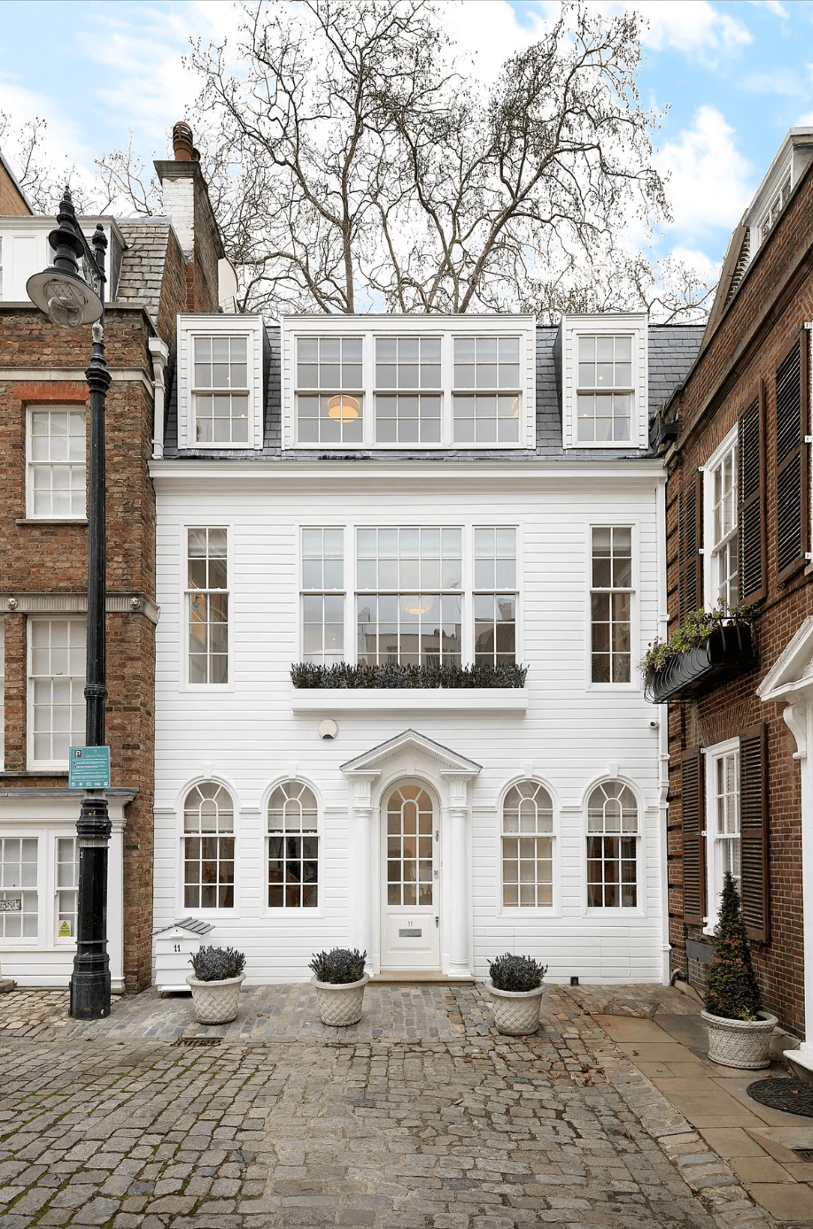 An unusual Belgravia mews house has hit the market  see inside