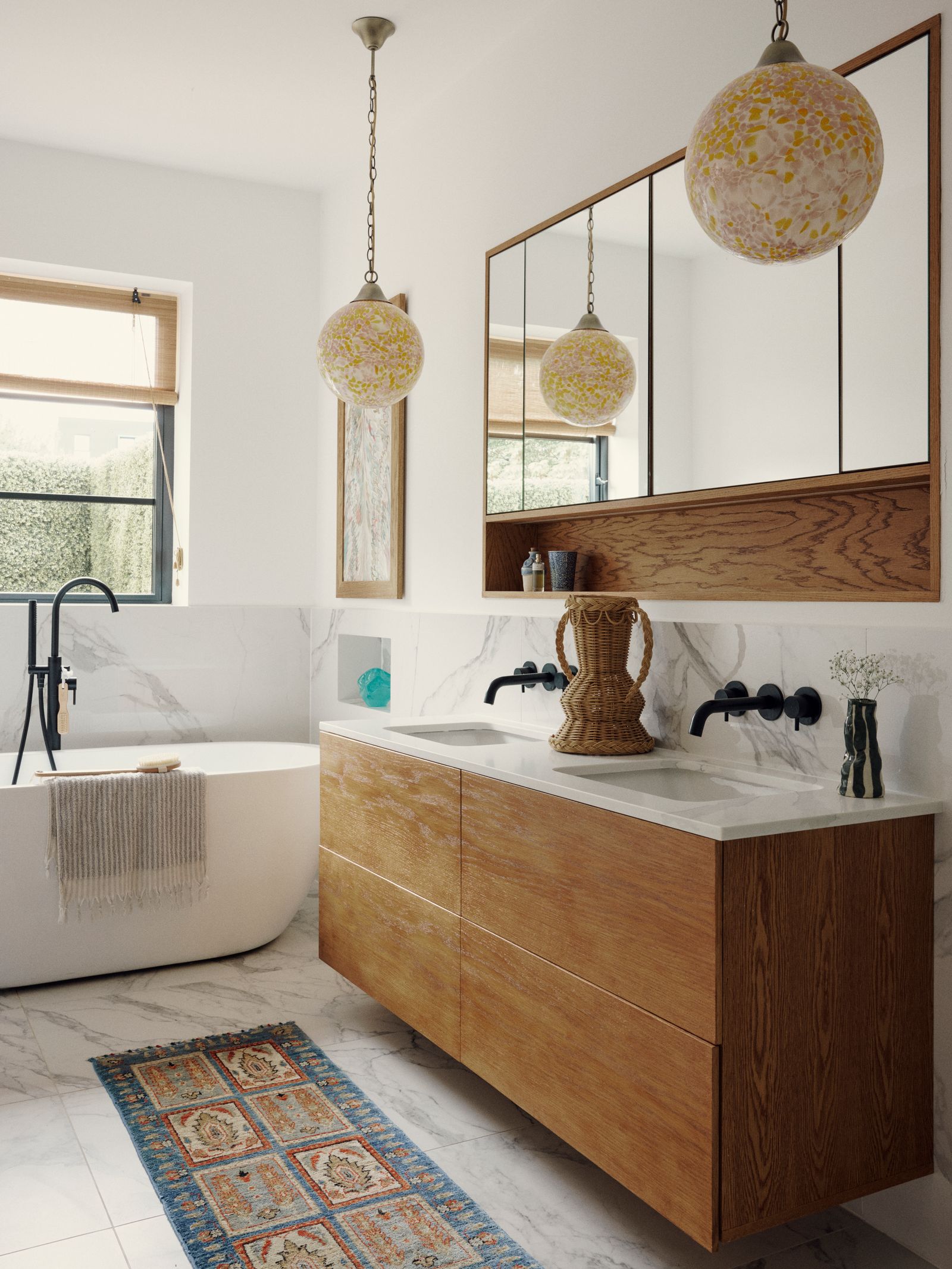 This bathroom in Rixo cofounder Orlagh McCloskeys house is a masterclass in incorporating maximum storage. It features...