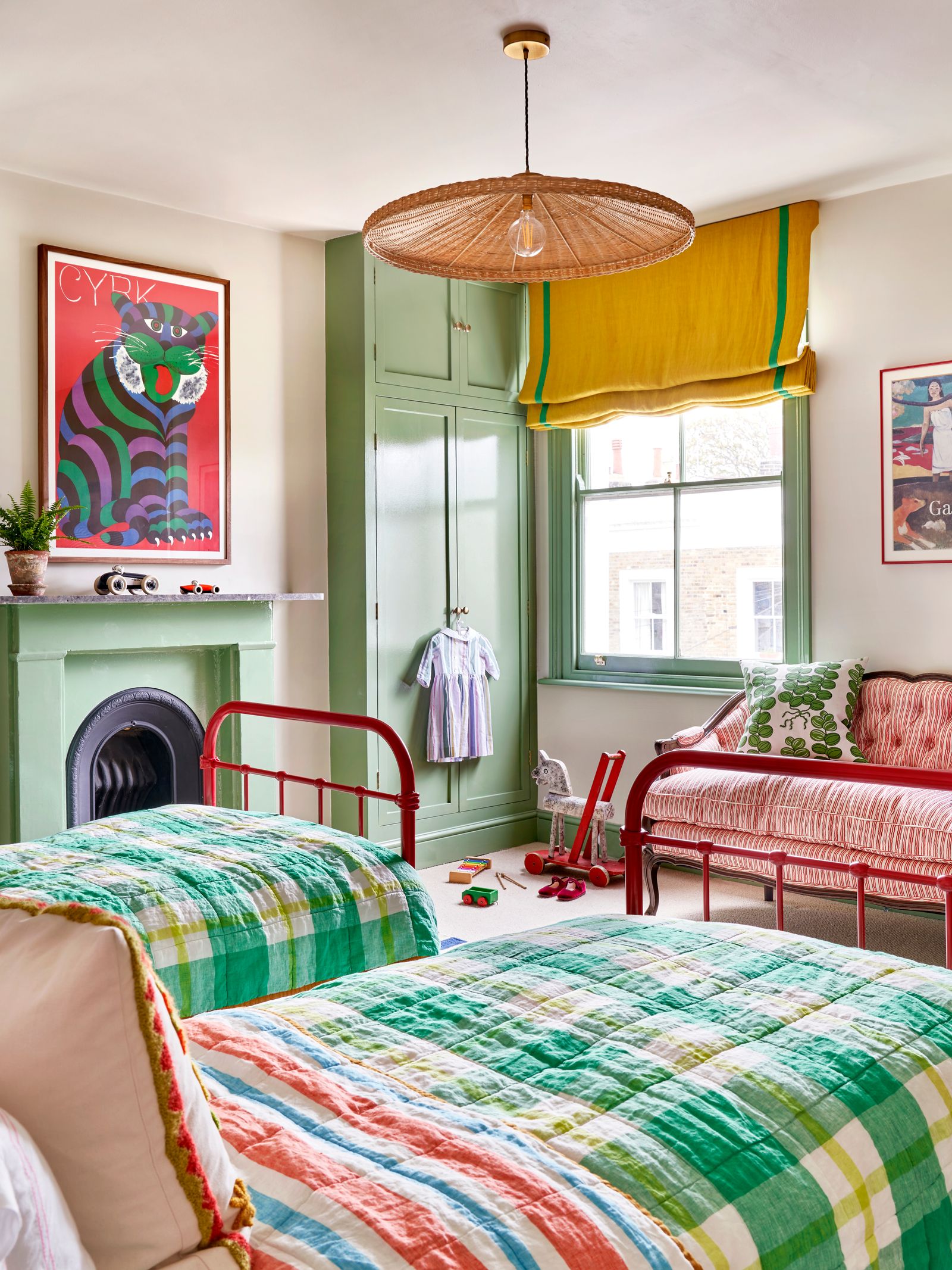 The minty green gloss woodwork is perfectly playful in this children's bedroom designed by Lonika Chande. The antique...