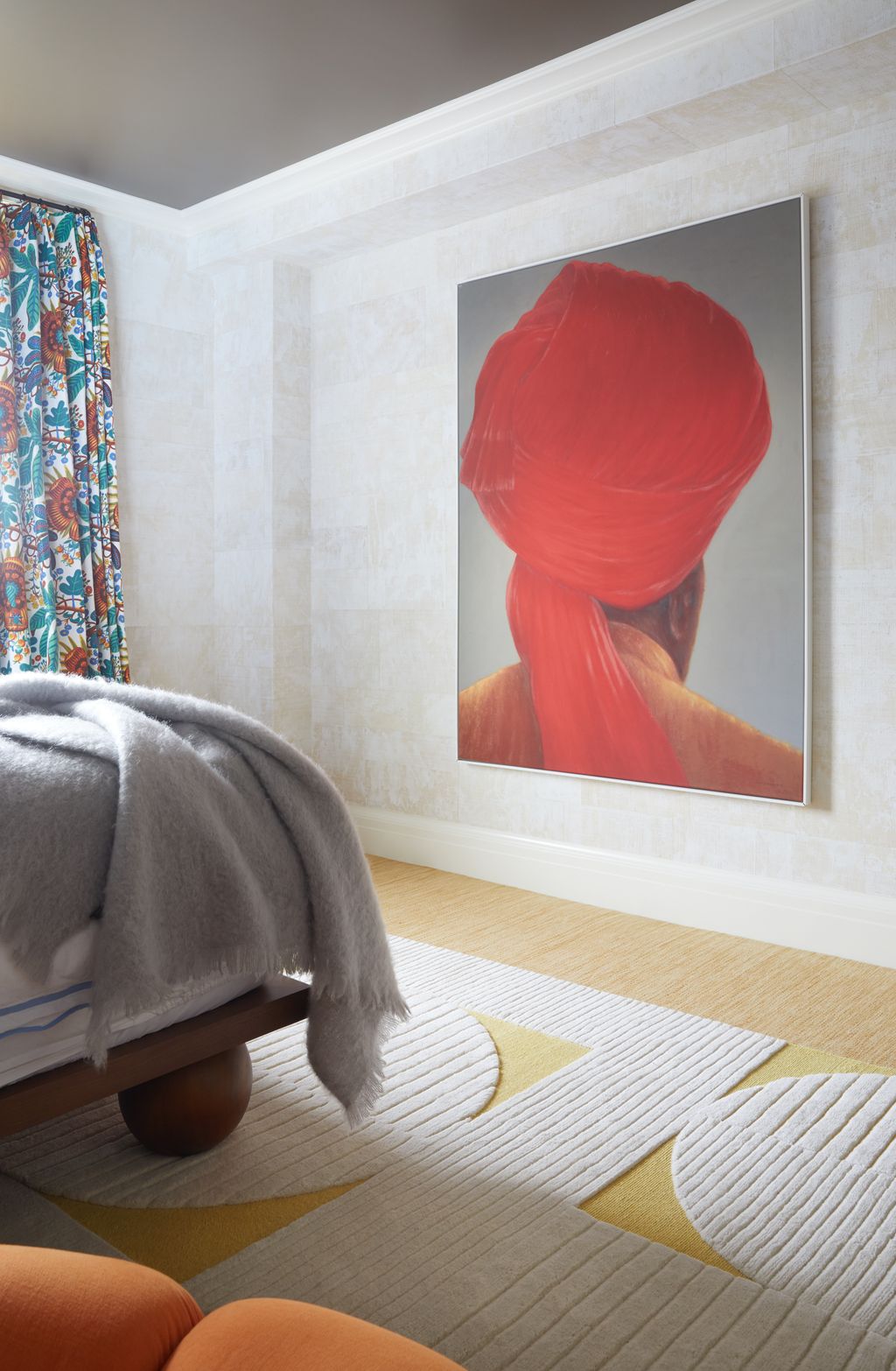 A monumental painting by Lincoln Seligman brings a certainair of mystery to the guest bedroom giving one something...