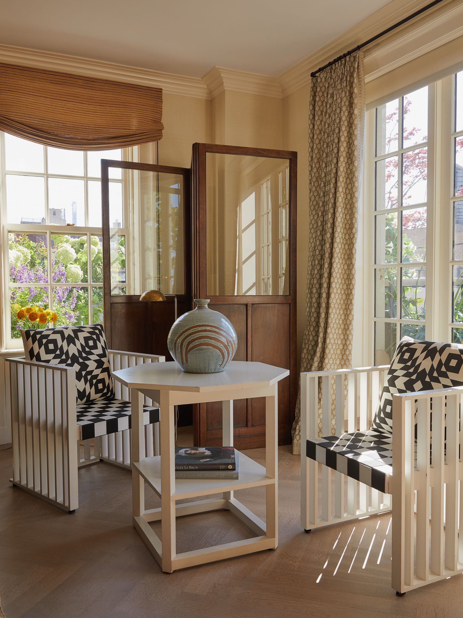 A 1980s reproduction of Josef Hoffmanns Purkersdorf armchairs and table designed circa 1905 for the Purkersdorf Sanatorium.