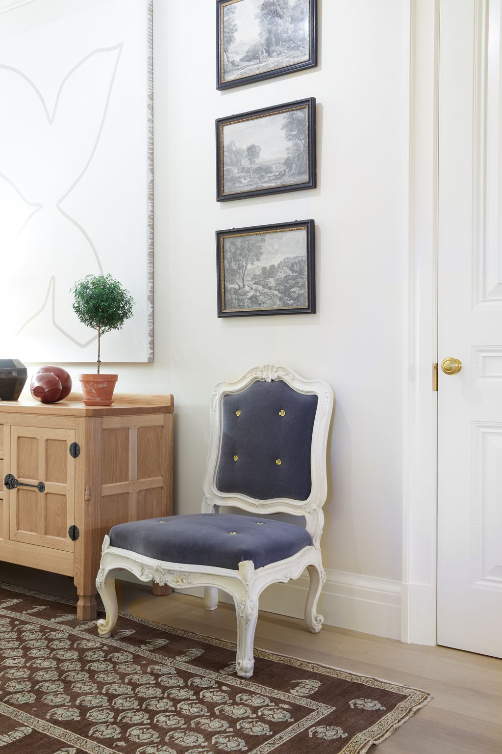 In the gallery the painting is by Paul Kremer and the mid18thcentury chair comes from Gerald Bland.