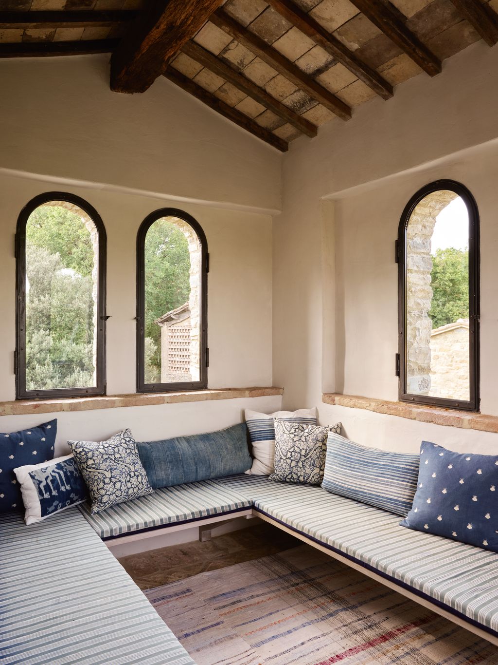 A mix of blue fabrics creates a calm scheme