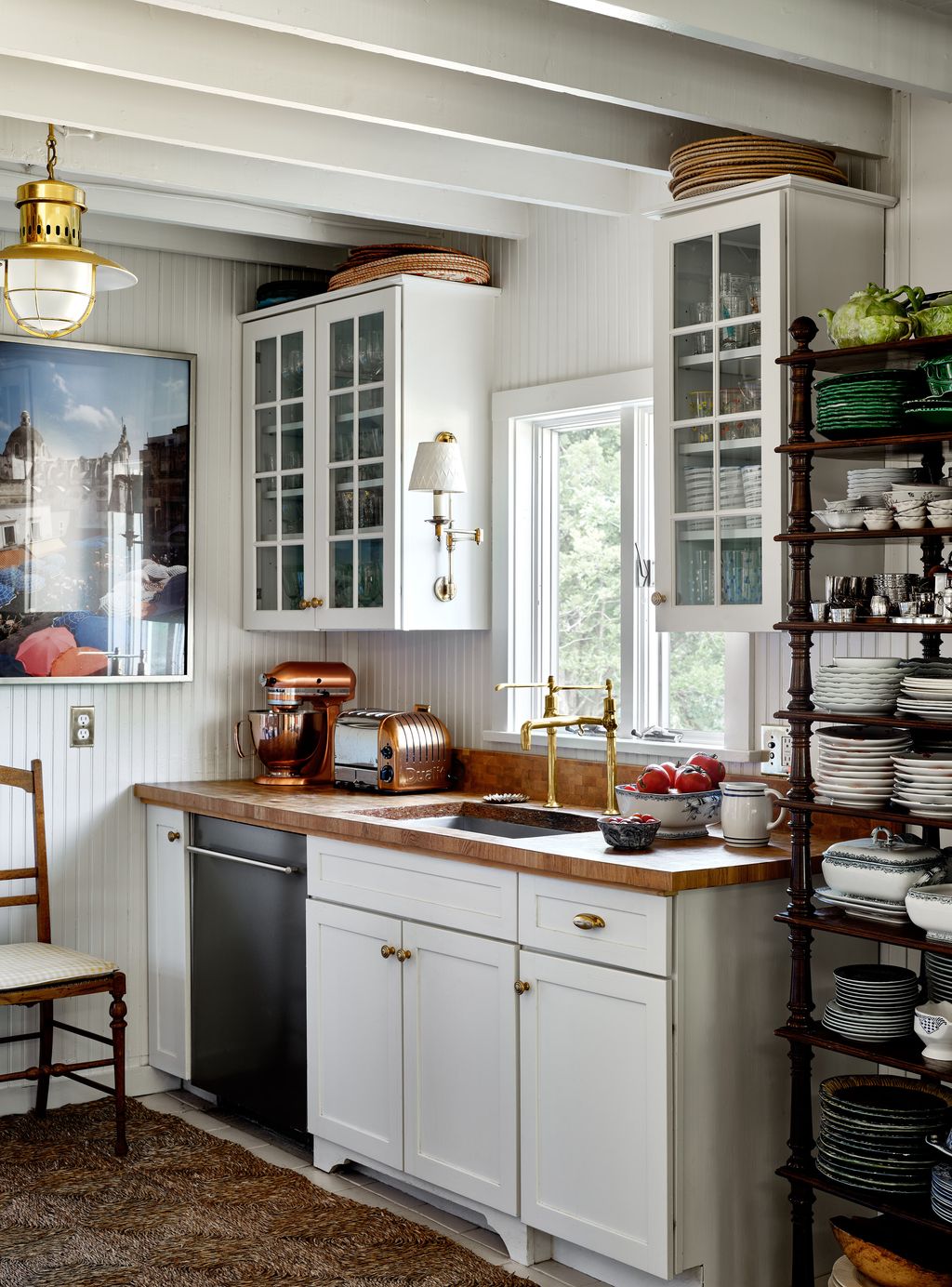 Max and Jordan kept the cabinets of the kitchen and replaced the hardware. The tap is an antique surgeon's tap and the...