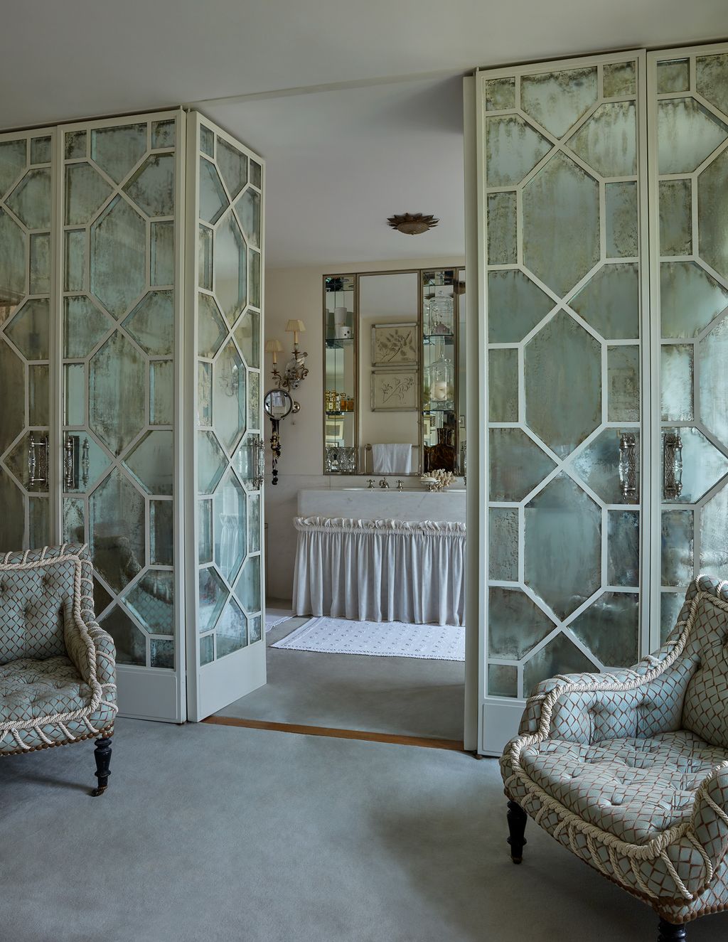 In Neisha's primary bedroom she has used antique mirror on the double doors that lead into the bathroom. Much like in...