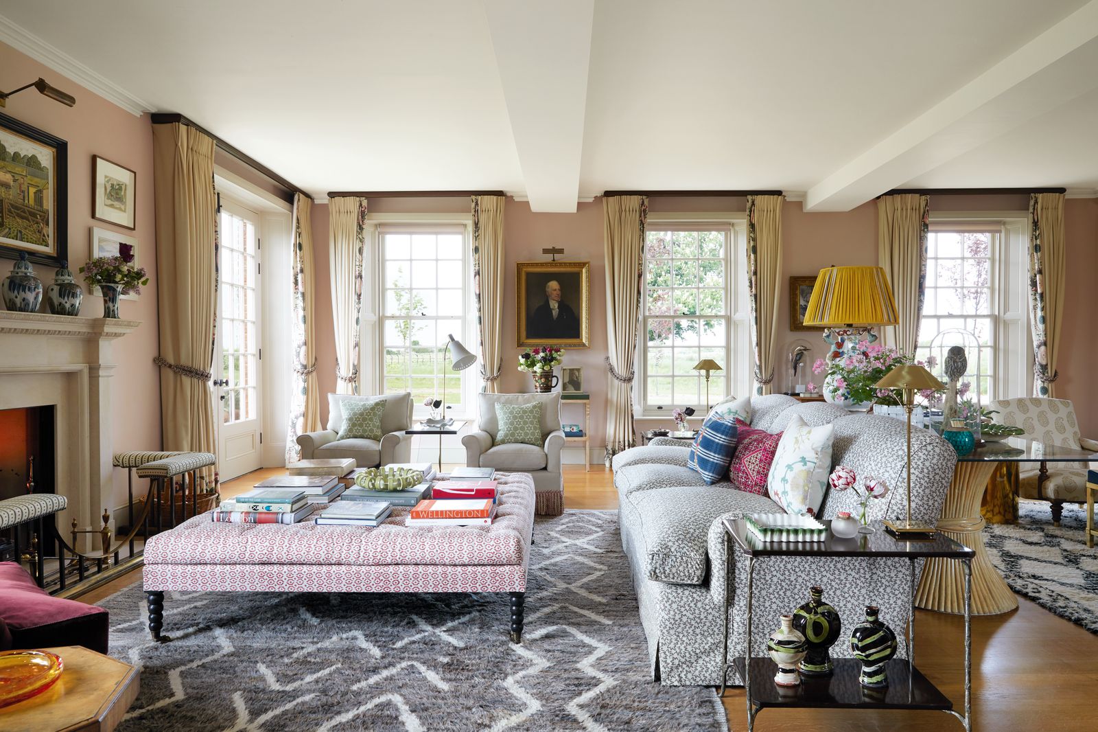 In the drawing room a generous ottoman in Galbraith amp Pauls ‘Links partners a sofa in ‘Nathalie from Claremont.