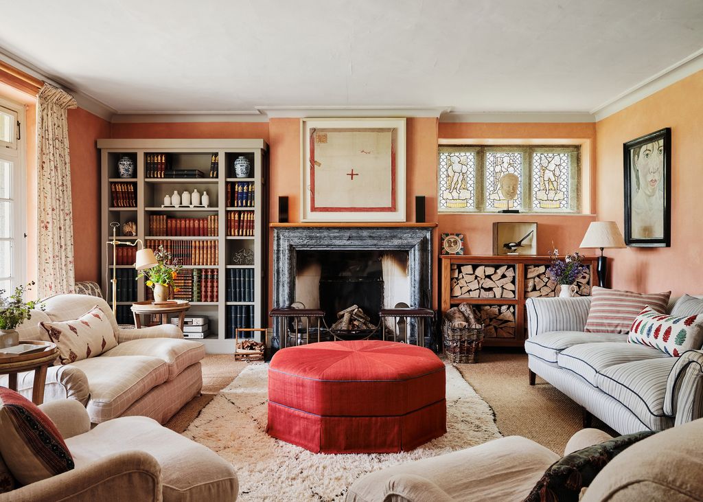 The sitting room in the newer part of the house was originally furnished by Robert Kime. Later Hugo's friend Camilla...