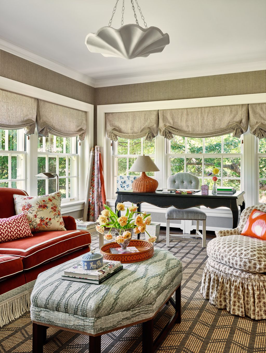 The walls and blinds in the office are both in the same Quadrille fabric with a Kathyrn Ireland design on the ottoman ....