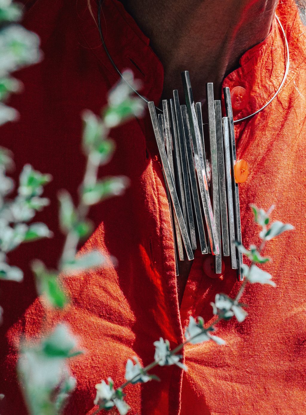 Diane wearing a necklace made by Bernar.