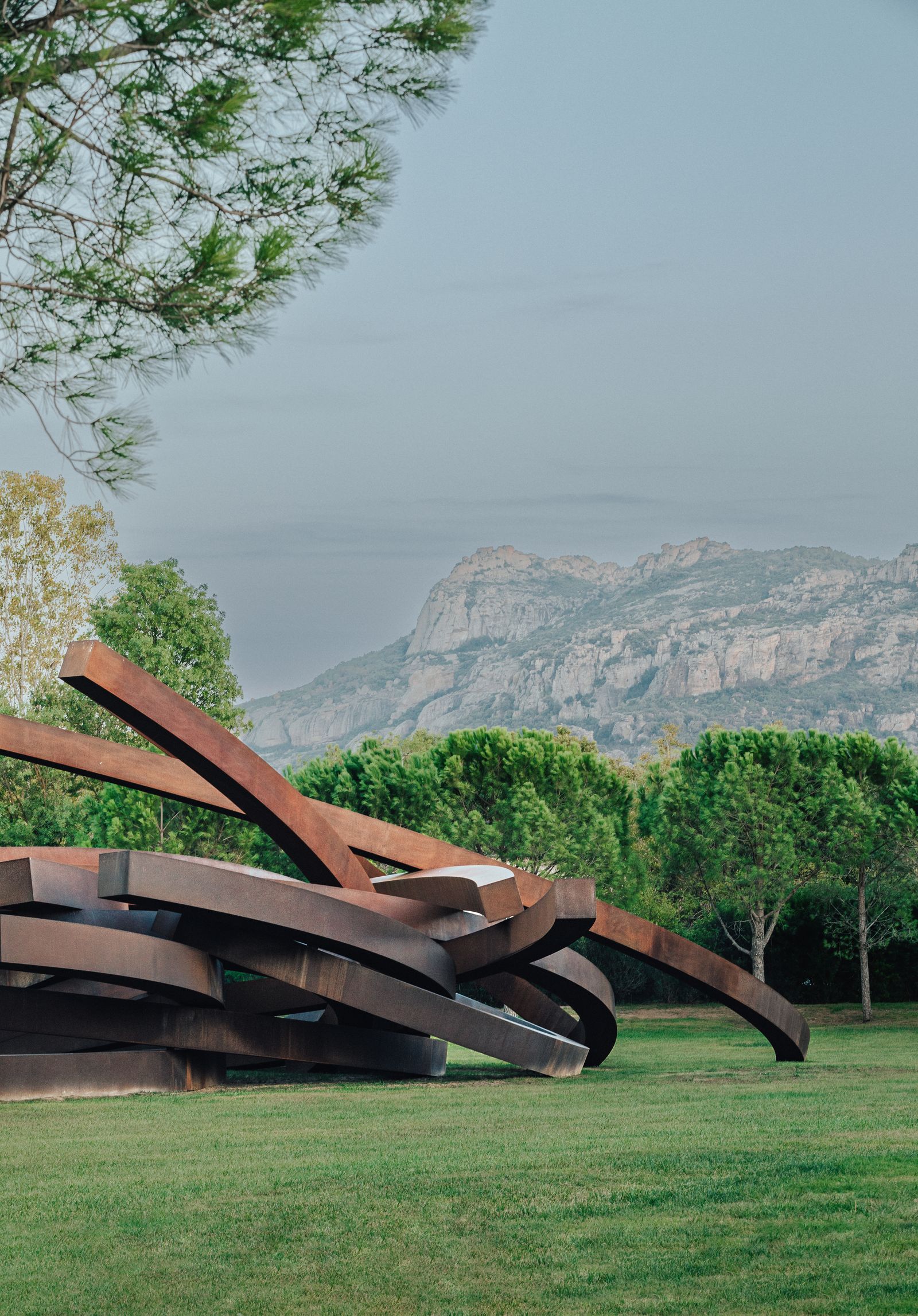 Bernars work in front of the dramatic Rocher de Roquebrune.