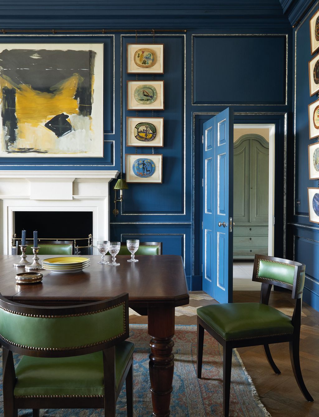 Soanes ‘Simplified Klismos chairs in bottlegreen cowhide leather partner an antique table. Walls in Farrow ...