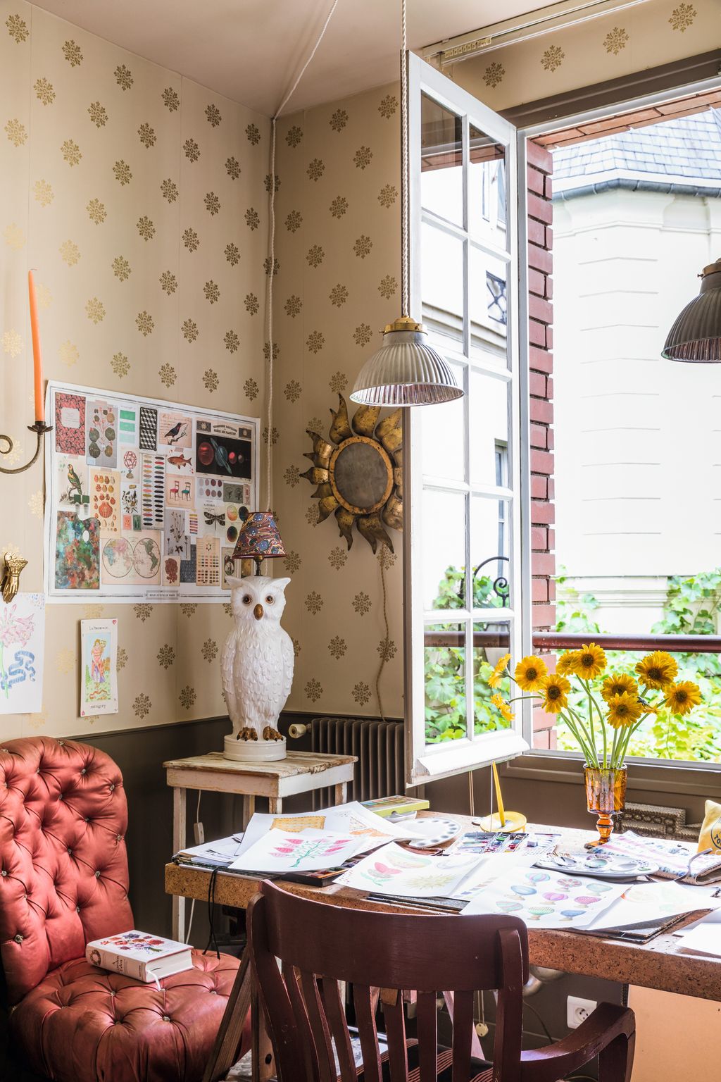 In his studio Marin works at a desk surrounded by inspiring objects