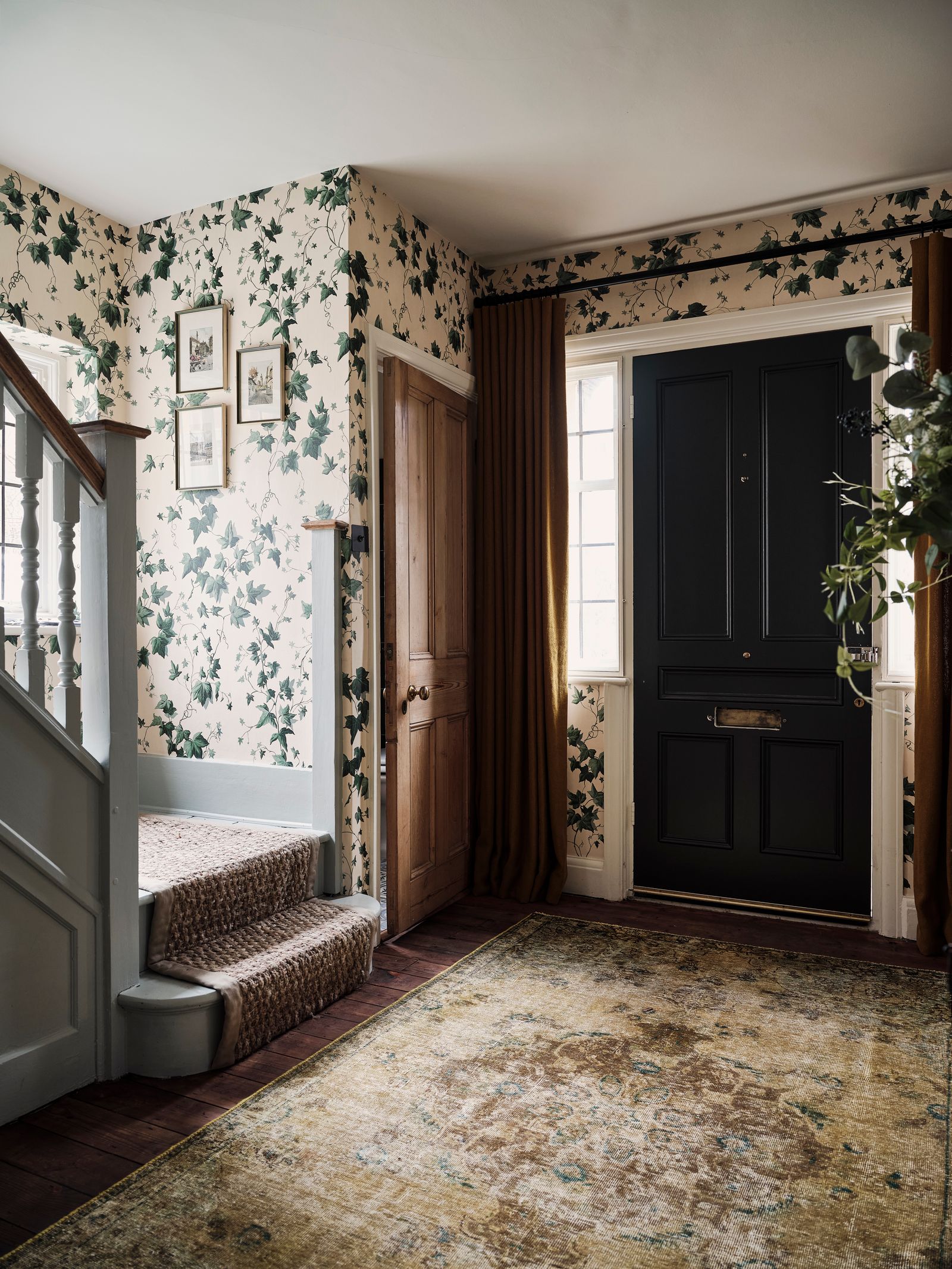 The wallpaper in the hallway is House of Hackney's ‘Hedera pattern