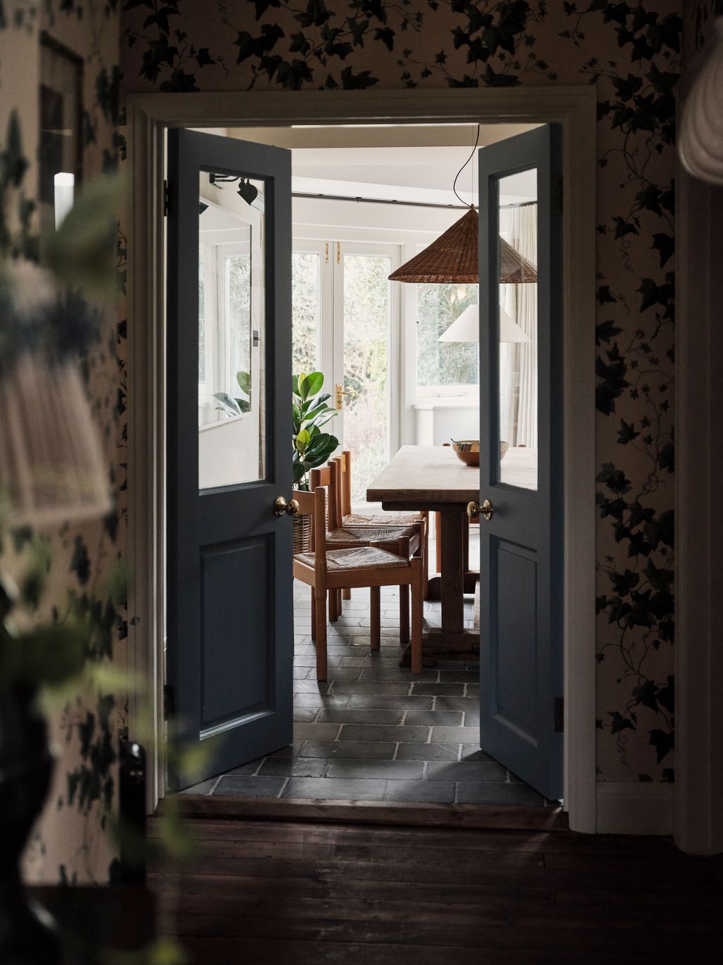The hallway opens up into the kitchen and dining area.