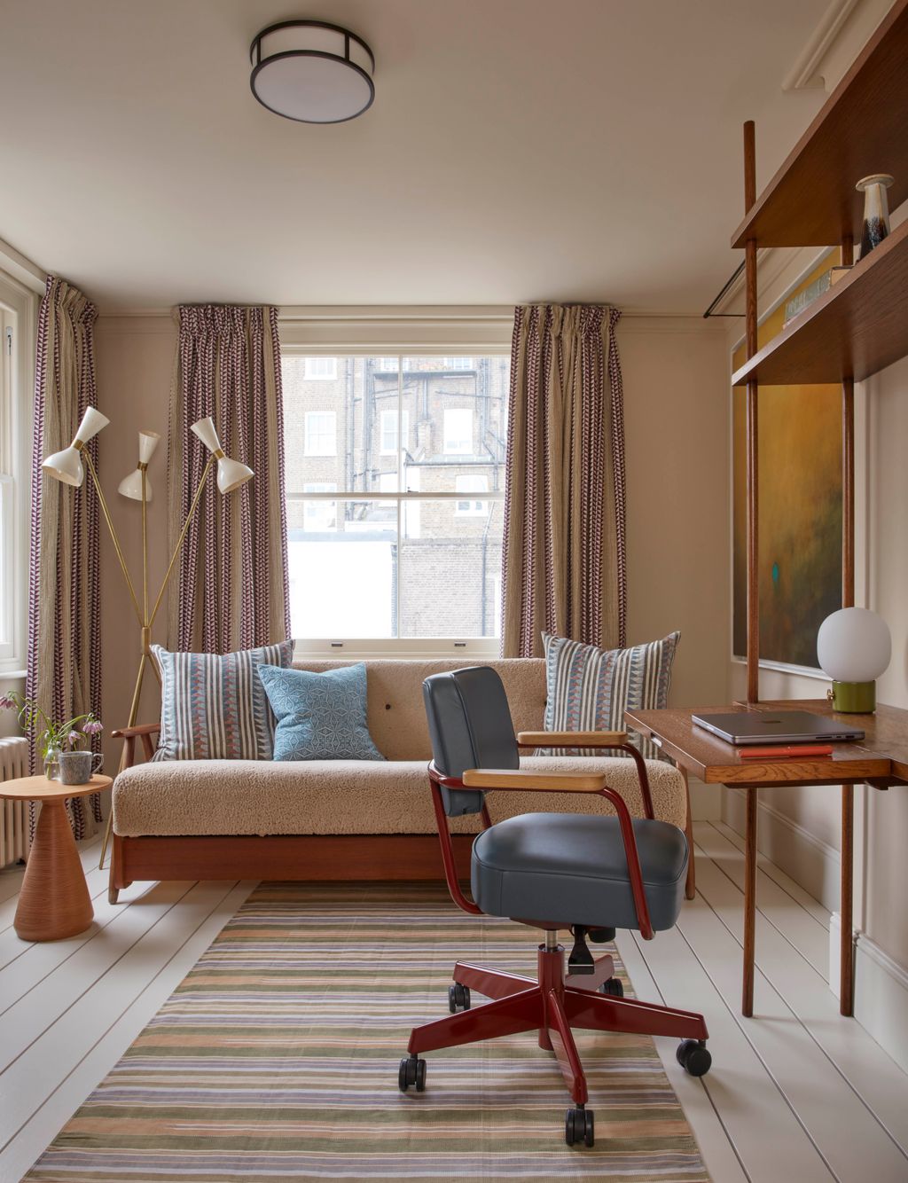 Between the upper floors sits a half landing that is the most serene room in the house perfect for a study and...