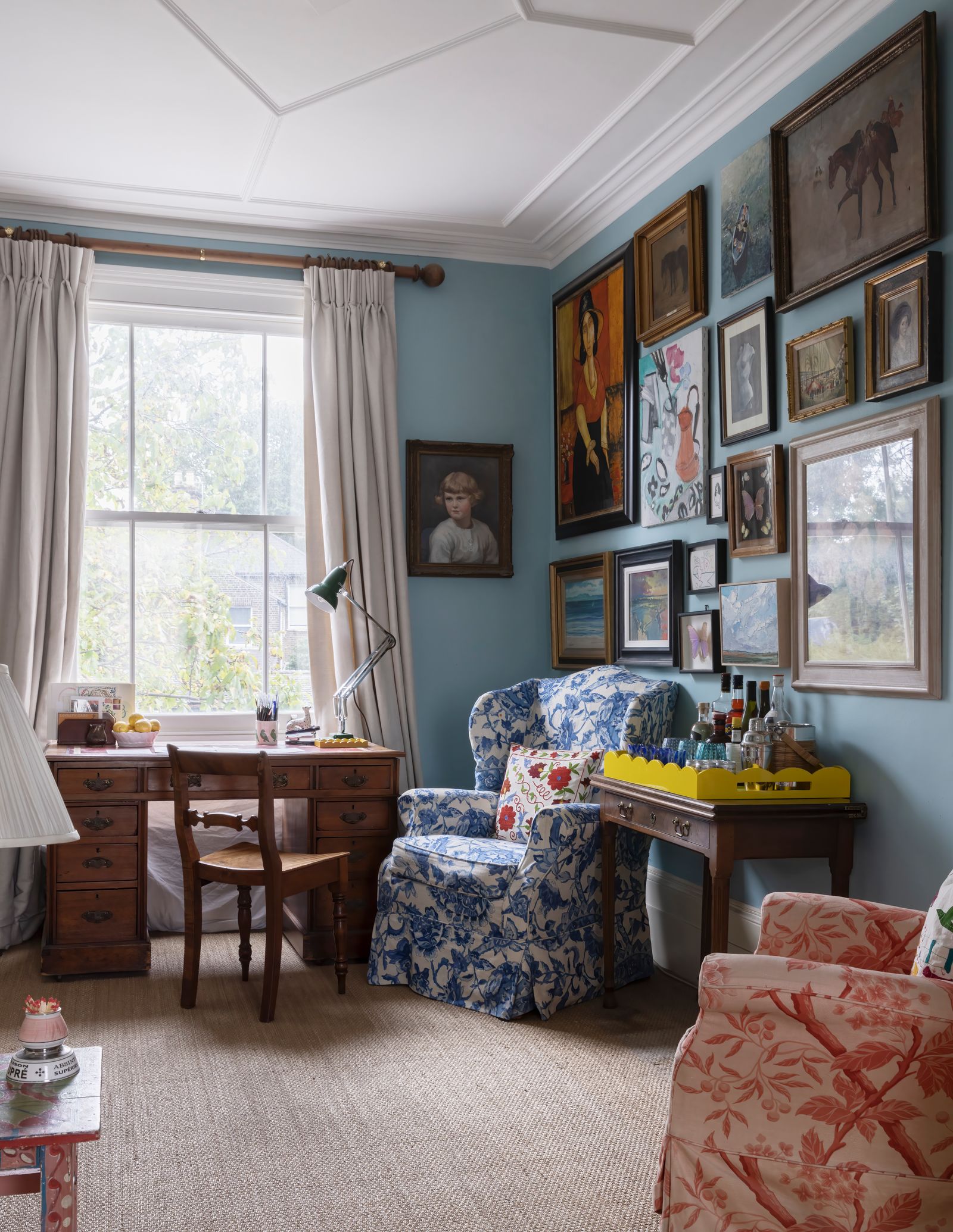 An artist's house decorated with riotous colour and collected paintings