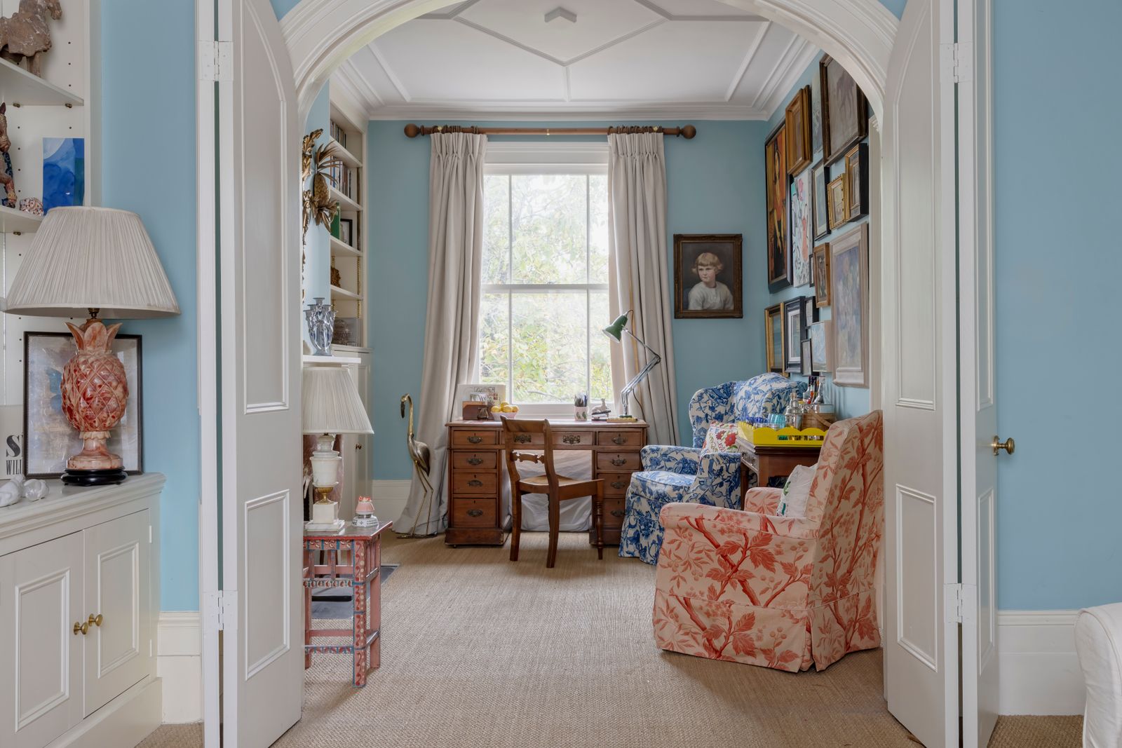 An artist's house decorated with riotous colour and collected paintings