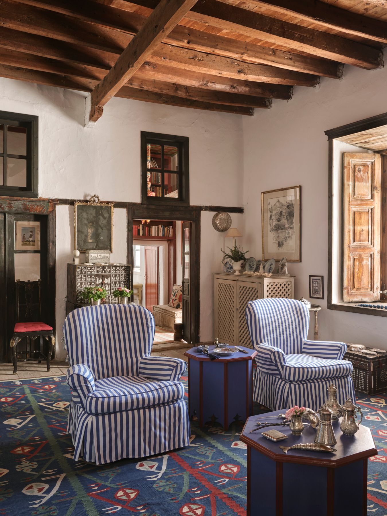 In the parlour a JSdesigned kilim in an enlarged Anatolian pattern covers the floor. Two JS Rothschild chairs are...