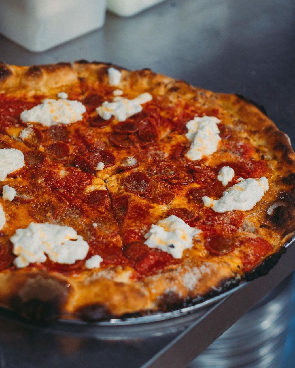 Can you imagine a month long waiting list for pizza That's what the case can be at Crisp W6 a tiny pizza joint operating...