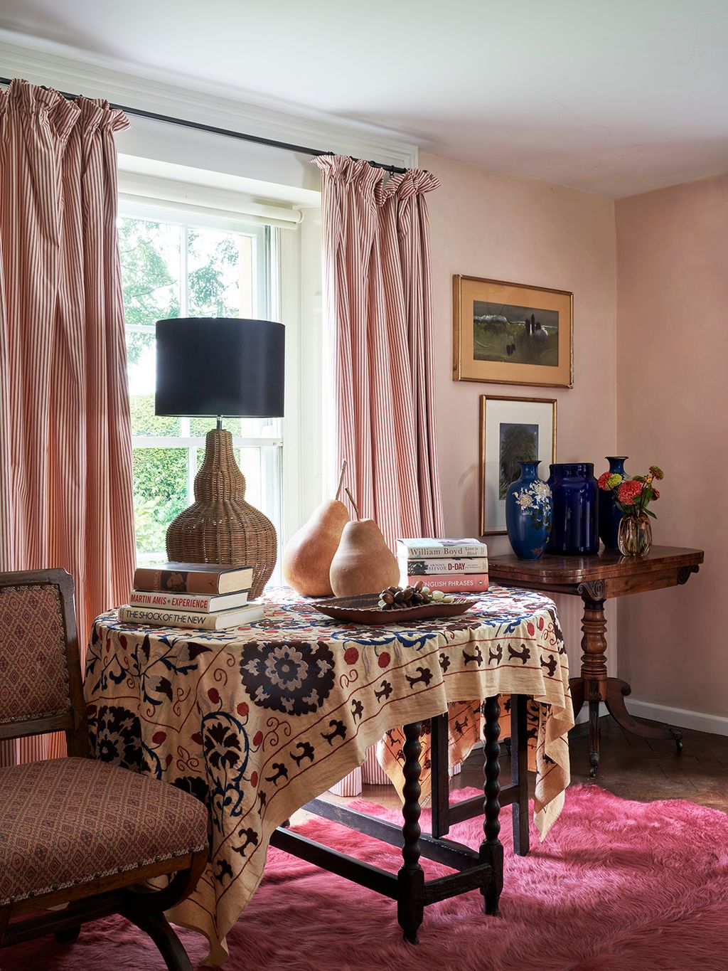 Penelope picked up this suzanistyle embroidery in Istanbul and matched it with giant ceramic pears and an OKA lamp. The...