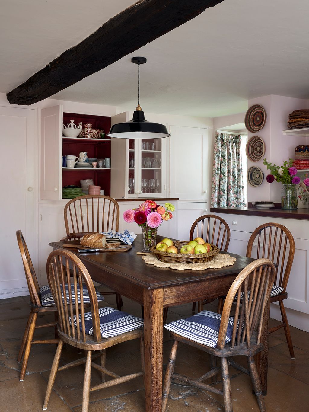 This pretty kitchen has some lovely details from the crockery and glass cupboard interior painted in Farrow  Ball's...